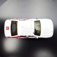 Load image into Gallery viewer, Matchbox 2000 Holden Commodore White/Red #11 1-75 Series
