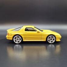 Load image into Gallery viewer, Hot Wheels 2022 &#39;89 Mazda Savanna RX-7 FC3S Yellow Nightburnerz 5 Pack Exclusive
