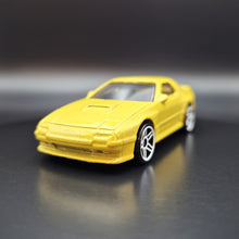 Load image into Gallery viewer, Hot Wheels 2022 &#39;89 Mazda Savanna RX-7 FC3S Yellow Nightburnerz 5 Pack Exclusive
