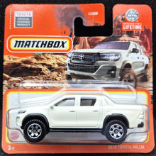 Load image into Gallery viewer, Matchbox 2023 2018 Toyota Hilux White #94 MBX Off-Road New
