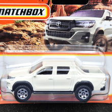 Load image into Gallery viewer, Matchbox 2023 2018 Toyota Hilux White #94 MBX Off-Road New
