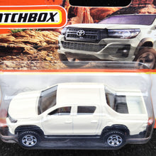 Load image into Gallery viewer, Matchbox 2023 2018 Toyota Hilux White #94 MBX Off-Road New
