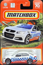 Load image into Gallery viewer, Matchbox 2023 Holden VF Commodore SSV White #35 MBX Roadtrip New Long Card
