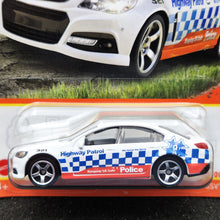 Load image into Gallery viewer, Matchbox 2023 Holden VF Commodore SSV White #35 MBX Roadtrip New Long Card
