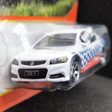 Load image into Gallery viewer, Matchbox 2023 Holden VF Commodore SSV White #35 MBX Roadtrip New Long Card
