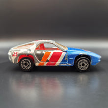 Load image into Gallery viewer, Matchbox 1986 Porsche 928 Blue/White #SF3 Matchbox 1-75
