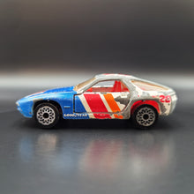 Load image into Gallery viewer, Matchbox 1986 Porsche 928 Blue/White #SF3 Matchbox 1-75
