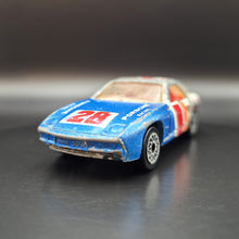 Load image into Gallery viewer, Matchbox 1986 Porsche 928 Blue/White #SF3 Matchbox 1-75
