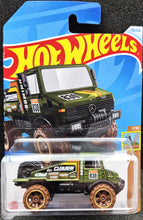 Load image into Gallery viewer, Hot Wheels 2024 Mercedes-Benz Unimog 1300L Olive Green #178 HW Dirt 1/10 New Long Card
