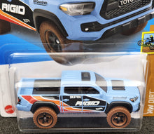 Load image into Gallery viewer, Hot Wheels 2024 &#39;20 Toyota Tacoma Light Blue #198 HW Dirt 4/10 New Long Card
