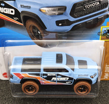 Load image into Gallery viewer, Hot Wheels 2024 &#39;20 Toyota Tacoma Light Blue #198 HW Dirt 4/10 New Long Card
