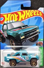 Load image into Gallery viewer, Hot Wheels 2024 &#39;87 Dodge D100 Teal  #38 HW Reverse Rake 1/5 New Long Card
