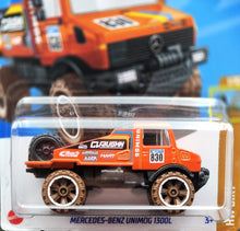 Load image into Gallery viewer, Hot Wheels 2024 Mercedes-Benz Unimog 1300L Orange #178 HW Dirt 1/10 New Long Card
