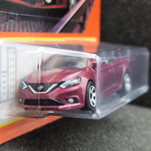 Load image into Gallery viewer, Matchbox 2024 2016 Nissan Sentra Red #9 MBX Metro 9/100 New Long Card
