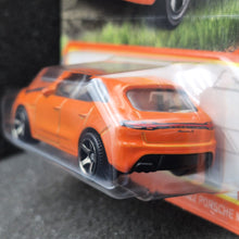 Load image into Gallery viewer, Matchbox 2024 2022 Porsche Macan Orange #11 MBX Roadtrip New Long Card
