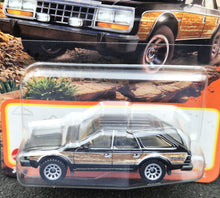 Load image into Gallery viewer, Matchbox 2024 1980 AMC Eagle Black #22 MBX Adventure New Long Card
