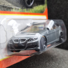 Load image into Gallery viewer, Matchbox 2024 2012 BMW 3 Series Touring Dark Grey #34 MBX Highway New Long Card
