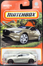 Load image into Gallery viewer, Matchbox 2024 2019 Mazda 3 Champagne #77 MBX Roadtrip New Long Card
