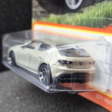 Load image into Gallery viewer, Matchbox 2024 2019 Mazda 3 Champagne #77 MBX Roadtrip New Long Card
