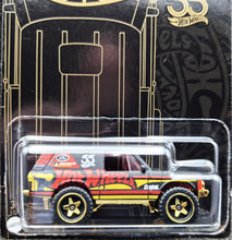 Load image into Gallery viewer, Hot Wheels 2023 Range Rover Classic Matte Black 55th Anniversary Black &amp; Yellow Series 4/6 New
