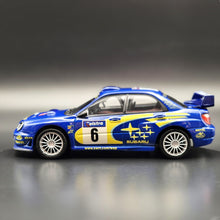 Load image into Gallery viewer, Cararama 2001 Subaru Impreza WRC Rally Car Blue #143 1:43 Die Cast Model
