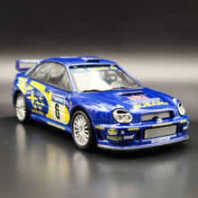 Load image into Gallery viewer, Cararama 2001 Subaru Impreza WRC Rally Car Blue #143 1:43 Die Cast Model
