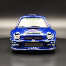 Load image into Gallery viewer, Cararama 2001 Subaru Impreza WRC Rally Car Blue #143 1:43 Die Cast Model
