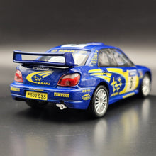 Load image into Gallery viewer, Cararama 2001 Subaru Impreza WRC Rally Car Blue #143 1:43 Die Cast Model
