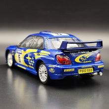 Load image into Gallery viewer, Cararama 2001 Subaru Impreza WRC Rally Car Blue #143 1:43 Die Cast Model
