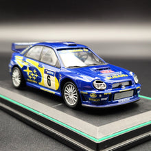 Load image into Gallery viewer, Cararama 2001 Subaru Impreza WRC Rally Car Blue #143 1:43 Die Cast Model
