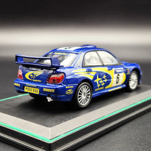 Load image into Gallery viewer, Cararama 2001 Subaru Impreza WRC Rally Car Blue #143 1:43 Die Cast Model
