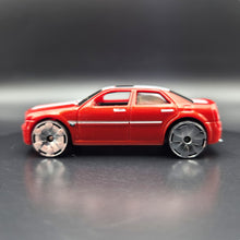 Load image into Gallery viewer, Hot Wheels 2009 Chrysler 300C Hemi Dark Orange #61 Track Stars 7/12

