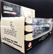 Load image into Gallery viewer, Classic Carlectables 2004 Holden VY Commodore Team Kiwi Racing Craig Baird #1021-2 1:43 Model
