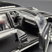 Load image into Gallery viewer, Welly 2010 Porsche Cayenne Turbo Black #42348 1:36 Collection Series
