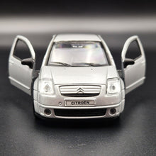 Load image into Gallery viewer, Welly 2003 Citroen C2 Silver #42351 1:36 Collection Series
