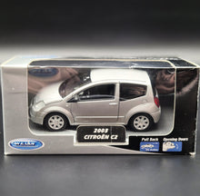 Load image into Gallery viewer, Welly 2003 Citroen C2 Silver #42351 1:36 Collection Series
