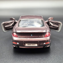 Load image into Gallery viewer, Welly 2010 BMW 645Ci Dark Violet #2353 1:36 Collection Series
