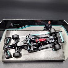 Load image into Gallery viewer, Bburago 2021 Mercedes AMG Petronas Formula 1 W12 Lewis Hamilton #44 1:43
