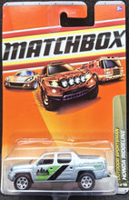 Load image into Gallery viewer, Matchbox 2010 Honda Ridgeline Silver #82 Outdoor Sportsman 9/10 New Long Card
