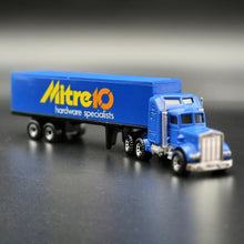 Load image into Gallery viewer, Matchbox 1987 Kenworth Aerodyne Semi &amp; Box Trailer Blue Mitre 10 Convoy CY-9 - Boxed In Incorrect Box
