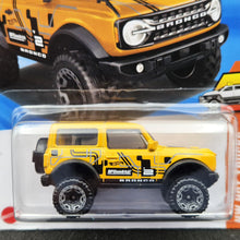 Load image into Gallery viewer, Hot Wheels 2025 '21 Ford Bronco Yellow #20 HW Hot Trucks 1/10 New Long Card