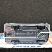 Load image into Gallery viewer, Hot Wheels 2025 '99 Ford F-150 SVT Lightning Black #94 HW Hot Trucks 7/10 New Long Card