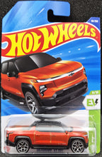 Load image into Gallery viewer, Hot Wheels 2025 Silverado EV RST Orange #86 HW EV 6/10 New Long Card
