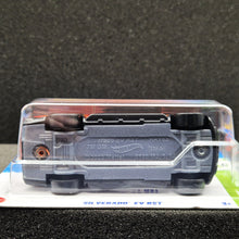 Load image into Gallery viewer, Hot Wheels 2025 Silverado EV RST Orange #86 HW EV 6/10 New Long Card