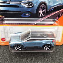 Load image into Gallery viewer, Matchbox 2024 Citroen e-C4 Light Blue #84 MBX Metro New Sealed Box