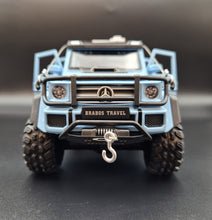 Load image into Gallery viewer, Explorafind 2019 Mercedes-Benz G550 4x4 Squared Sky Blue 1:24 Die Cast SUV