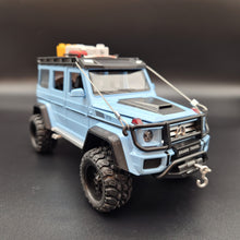 Load image into Gallery viewer, Explorafind 2019 Mercedes-Benz G550 4x4 Squared Sky Blue 1:24 Die Cast SUV