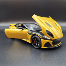Load image into Gallery viewer, Explorafind 2023 Aston Martin DBS Coupe Yellow 1:24 Die Cast Car