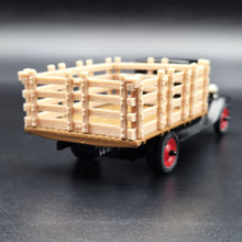 Load image into Gallery viewer, ERTL 1930 Chevrolet Stake Truck Black Livestock Transportation Carl Jones Prop #2503 1:43 Diecast Model