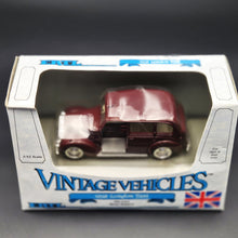 Load image into Gallery viewer, ERTL 1958 London Taxi-Austin FX3 3 Door Taxi Cab Maroon #2551 1:43 ERTL Vintage Vehicles Diecast Model